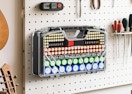 a battery organizer case on a pegboard