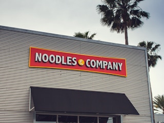Exterior of a Noodles & Company restaurant.