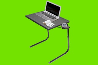 Adjustable table from QVC on a green background