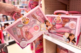 disney princess makeup tote in front of a hair tote on a target shelf