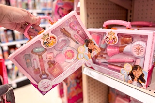 disney princess makeup tote in front of a hair tote on a target shelf