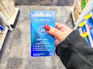 hand holding gillette clinical deodorant