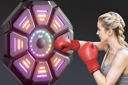 a music boxing machine with a woman boxing it