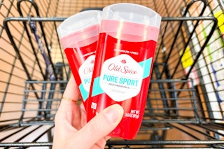 hand holding old spice deodorant sticks