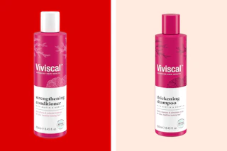 two pink and white bottles of shampoo and conditioner