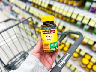 hand holding nature made zinc in walgreens