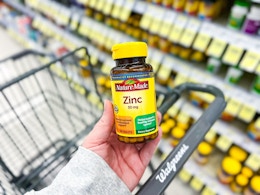 hand holding nature made zinc in walgreens