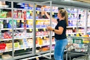 a woman shopping in a kroger grocery store 