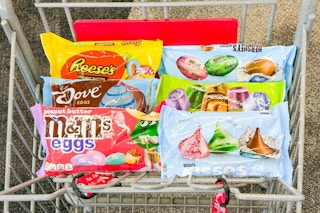 reeses, hersheys, dove, rolo, and m&ms candy in a cart