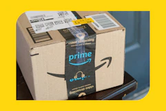 person opening an amazon box