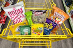 dollar general $1 aisle snacks in shopping cart