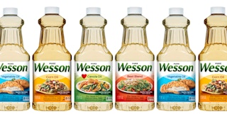 pure wesson vegetabble, corn, canola, and best blend oil bottles