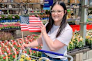 a woman shopping at lowe's for memorial day
