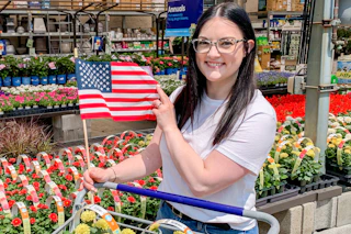 a woman shopping at lowe's for memorial day