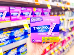 hand holding tampax radiant tampons in walgreens