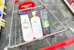 shopping cart with three dove body washes