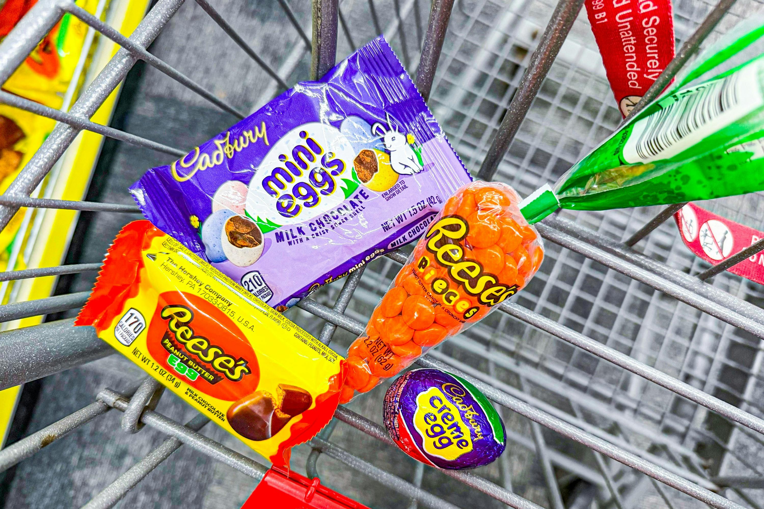 reeses and cadbury candy in a cart
