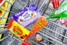 reeses and cadbury candy in a cart