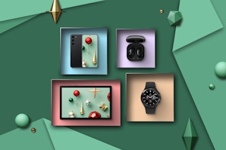Samsung Galaxy Tab, ear buds, Watch4, and phone on a holiday background