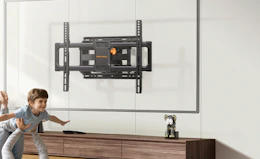 a TV mount on a wall in a room