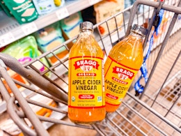 2 Bragg Apple Cider Vinegars in a Walmart shopping cart