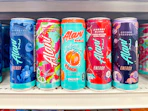 alani nu energy drinks sitting on a target shelf