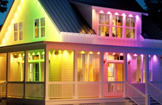 colorful lights on the outside of a house