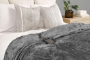 a sunbeam electric blanket on a bed