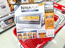 ninja flip air fryer toaster oven sitting on top a target cart