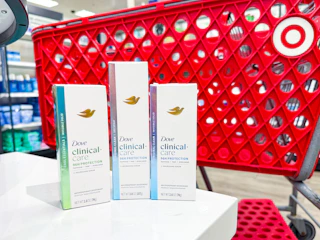 3 dove clinical deodorants sitting in front a target cart