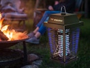 a solar bug zapper on a lawn in a yard