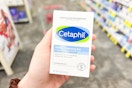 person holding a cetaphil cleansing bar