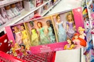 disney princess doll set sitting in a target cart