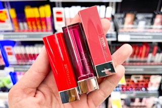 hand holding three maybelline color sensational lipsticks
