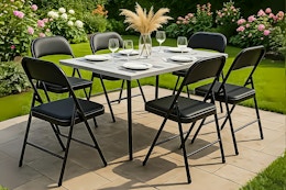 Lifestyle image of six SUGIFT Padded Seats around a table in an outdoor setting