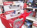 2 razor scooters sitting on a target cart