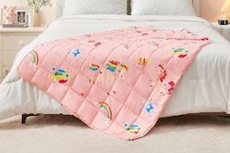kids weighted blanket on bed