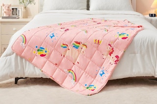kids weighted blanket on bed