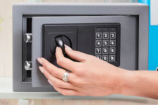 Lifestyle image of the Stalwart Small Safe Box being opened up