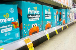 pampers diaper boxes in a store aisle with a clearance tag