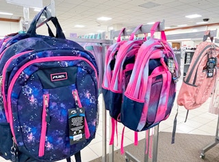 fuel backpacks on racks