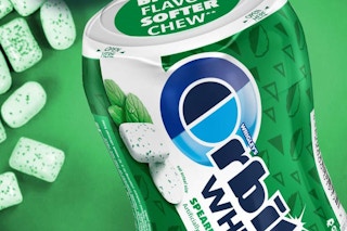 a pack of orbit white gum on a green background