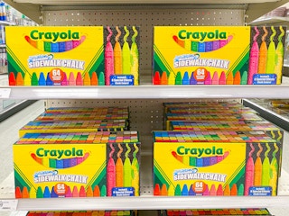Boxes of 64 count Crayola Washable Sidewalk Chalk stocked on an endcap shelf at Target.