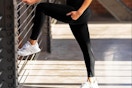 a woman wearing black leggings