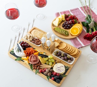 a cheese board with food on it