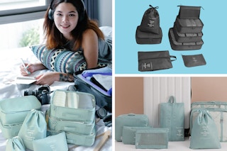 A woman on a bed with a set of packing cubes, the same set in black, the same set full of clothing and items.