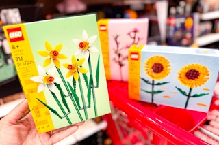 3 flower lego sets on a target cart