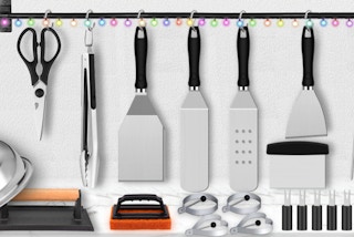 grilling tools on a bar