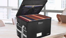 a box on a table with documents