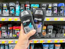 2 Axe Deodorant Sticks held up in deodorant aisle in Walmart stores